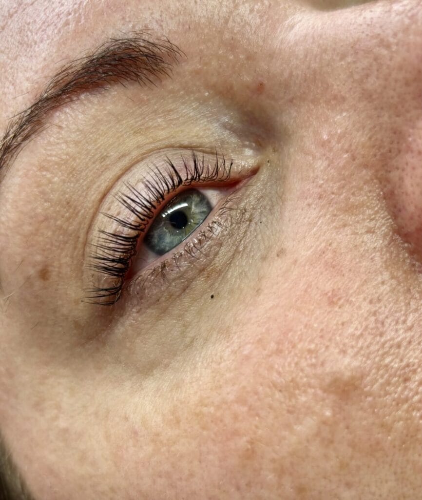 Beautiful lash lift and tint results showcasing curled, darkened natural eyelashes at YOLOve beauty salon