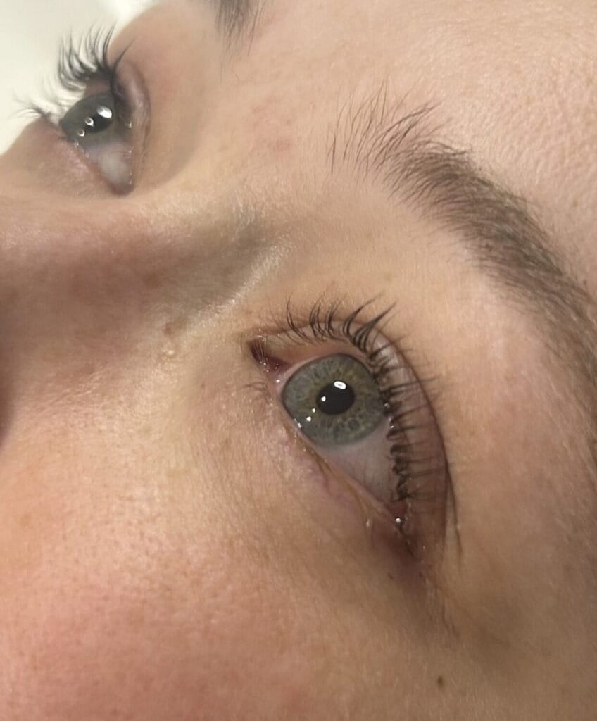 Beautiful green eyes with professionally styled eyelash extensions at YOLOve beauty salon in Dartmouth Nova Scotia