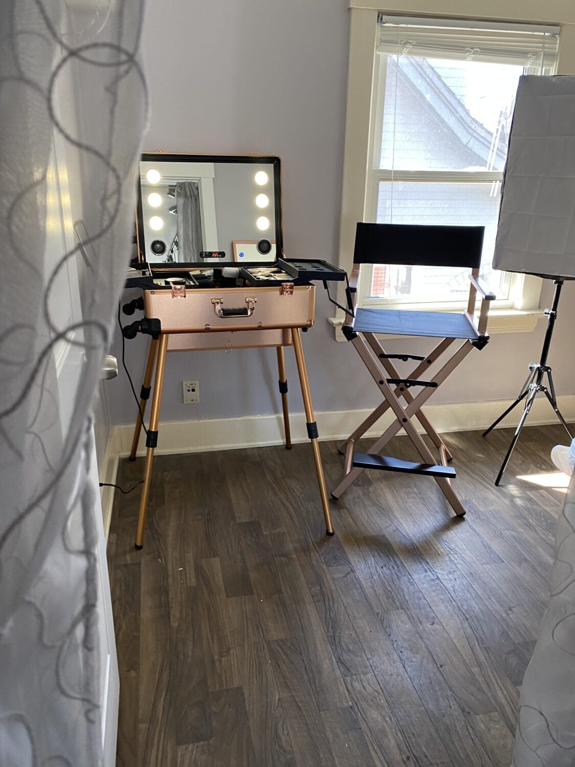 Professional makeup station with Hollywood vanity mirror and director's chair at YOLOve beauty salon Dartmouth